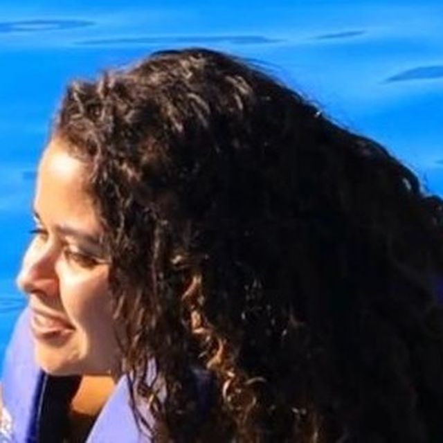 Hellen nadando com golfinhos em Cabo San Lucas, México